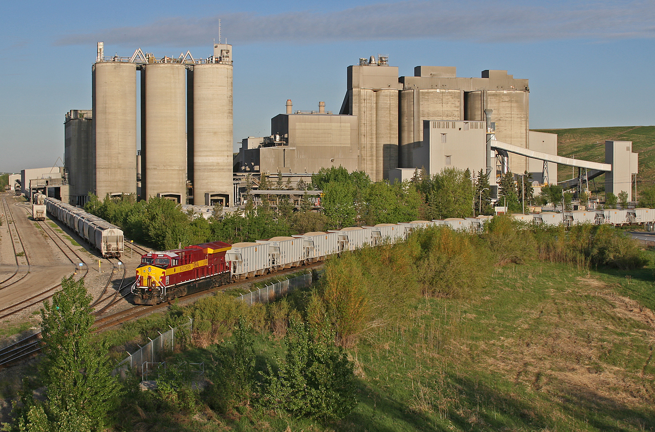 Silver Creek to Acheson unit train U 74691 29 rolls off the Sangudo Sub at Bissell Yard.  746 shuttles back and forth from the Standard General quarry in Silver Creek, about 30 miles west of Whitecourt, Alberta to the Standard General Asphalt Plant in Acheson, about 14 miles west of Edmonton.  CN 3069, the Wisconsin Central heritage unit has been captive in this service for the last month.