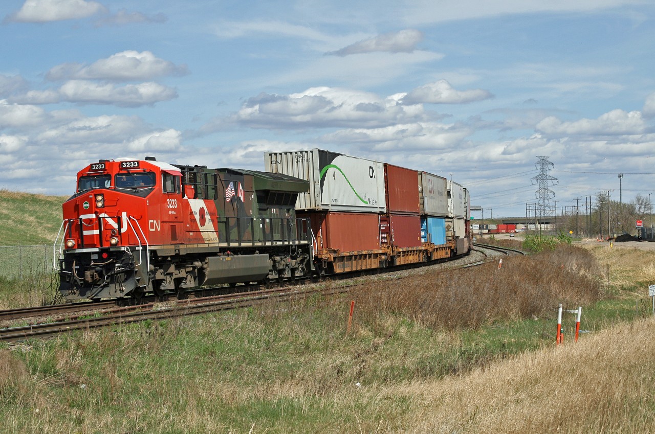 Z 11131 14 rolls into Edmonton with CN 3233 sporting a special scheme honouring the Canadian and American armed forces.