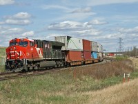 Z 11131 14 rolls into Edmonton with CN 3233 sporting a special scheme honouring the Canadian and American armed forces.