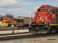 CN L568 is viewed setting-off in the Stratford yard with 4136, 4125, 7083 and 4790. In the background, the power for Goderich-Exeter Railway 581 awaits their next work day. 