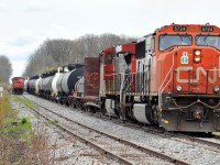 Hot times at Onondaga! A40131 09 bypasses A40231 09 which has cleared into the siding for the meet. A401 had CN 5724, CN 2595, and 56 cars. A402 had CN 8902 and CN 5633 headed down to Garnet lite power