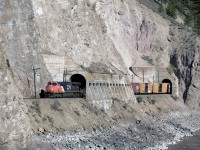Westbound CN 2221 at the Skoona Sheds/Tunnels, just west of Spences Bridge, on CNs Ashcroft Sub.  
