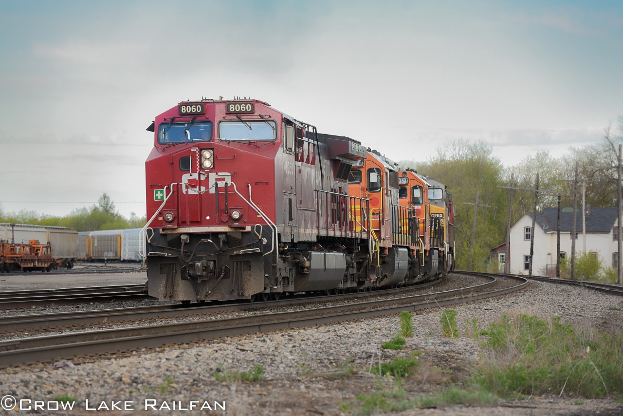 CP 143 rolls into the north track at Smiths Falls with 2 WCOR Ex. QNS&L SD40-2's and a UP trailing. Just moments later it would swap crews and continue west.


I'm glad it swapped crews as the Montreal crew would've probably thought we were crazy to chase the train for more shots down the line. :)
