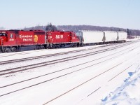 Another train I really miss these days is the old Guelph Junction turn that used to run from Toronto to the junction to mainly switch out OSR traffic then return home. It usually was in the junction from mid morning until early afternoon. When I started railfanning in the mid 1990's CP had two sets of power assigned to the junction. One was used for the run to Guelph and the other ran to Streetsville and back. When OSR took over here the Streetsville  job was relocated to Toronto as a home base. In the mid 1990's CP ran another Guelph turn job that typically had two SD40' and ran straight from Toronto to Guelph Jct. then dropped cars in Streetsville yard before returning home. When OSR began this job ended and was replaced with the train sees here. unfortunately a turn in the economy in 2007 would claim this train with it not returning again. Today the switch off the mainline seen here has been removed and any traffic for the Guelph Jct. Railway is dropped by mainline trains. It was nice this day catching a clean GP40 as typically GP9's rules this train.  