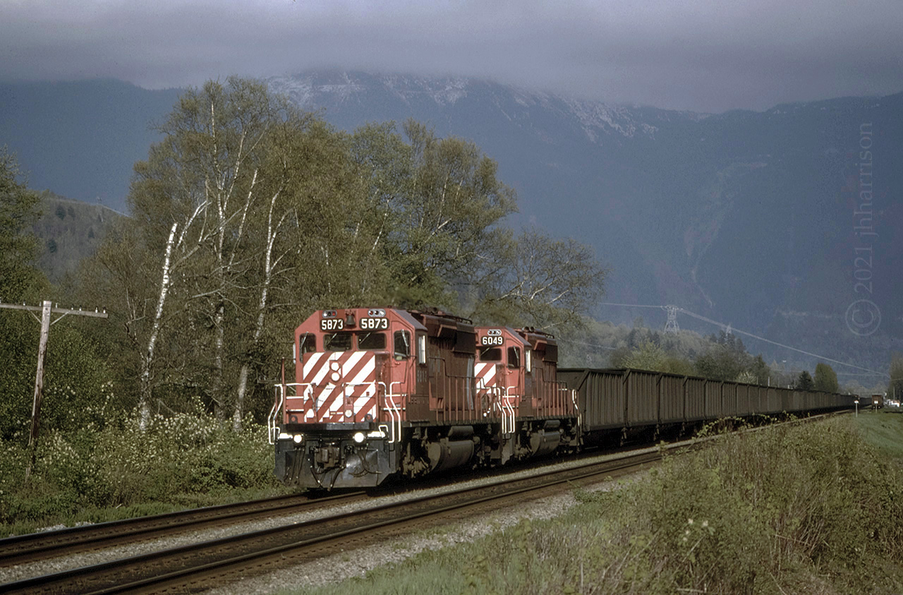 Westbound CP 5873 and 6049 at Agassiz on CPs Cascade Sub. With SD40-2s on the endangered species list now, I'm glad I was able to get so many of them. Quite sure the 5873 was sold for scrap in 2017 ... but I've seen a more recent shot of the 6049 taken in Calgary in September of 2019.