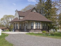 While taking a drive through Grey County I figured I'd make a quick stop at the old Harriston train station.  Service to Harriston began on the Wellington, Grey & Bruce Railway (under Great Western ownership) in 1871, later of course taken over by the GTR and finally CNR.  The exact date of construction of this station is listed differently, 1888 on the town website, 1904 on the plaque out front, circa 1905 in other sources, nonetheless it has aged well being in the care of the community as a senior's centre with a shuffleboard court (white fence at left) and can be rented for meetings and such.  The <a href=https://town.minto.on.ca/content/residents/recreation-and-facilities/halls-meeting-spaces/img_9626.jpg>interior has been restored</a> and it was <a href=https://town.minto.on.ca/content/residents/recreation-and-facilities/halls-meeting-spaces/train-station-1.jpg>repainted in 2013</a> from its previous green scheme.  Currently it is serving an important role as the Harriston and area covid-19 assessment centre on weekdays.<br><br>It seems I almost time machined this shot with <a href=http://www.railpictures.ca/?attachment_id=44430>Arnold's from 1981.</a><br><br><a href=http://www.railpictures.ca/?attachment_id=13990>CNR RSC-13s at Harriston</a> by Bill Thomson, January 1963.