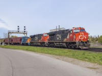 CN M394 is seen curving through Paris Junction with SW1200RS SVGX 1343 trailing the power.  Back on home rails after many years, this former CN unit built in 1959 with the same number was sold to CANAC in 1999, and later to Savage Services Corp. and it would appear has spent a number of years working at the Whiting, Indiana BP Refinery.<br><br>Seth B. was able to catch 1343 twice in 1985:<br><a href=http://www.railpictures.ca/?attachment_id=44513>January 1985: Working the fertilizer plant at Fort Saskatchewan, Alberta.</a><br><a href=http://www.railpictures.ca/?attachment_id=43720>March 1985: Working around Scotford Yard.</a>