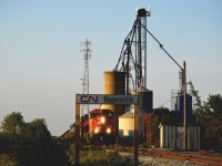 A late 402 recrew, pulling through Hagersville during the evening hours. 402 sat dead at Brantford for a majority of the day before this recrew took it up the Hagersville with about 27 cars. Motive power was CN SD75I 5733 & CN GE C44-9W 2566.