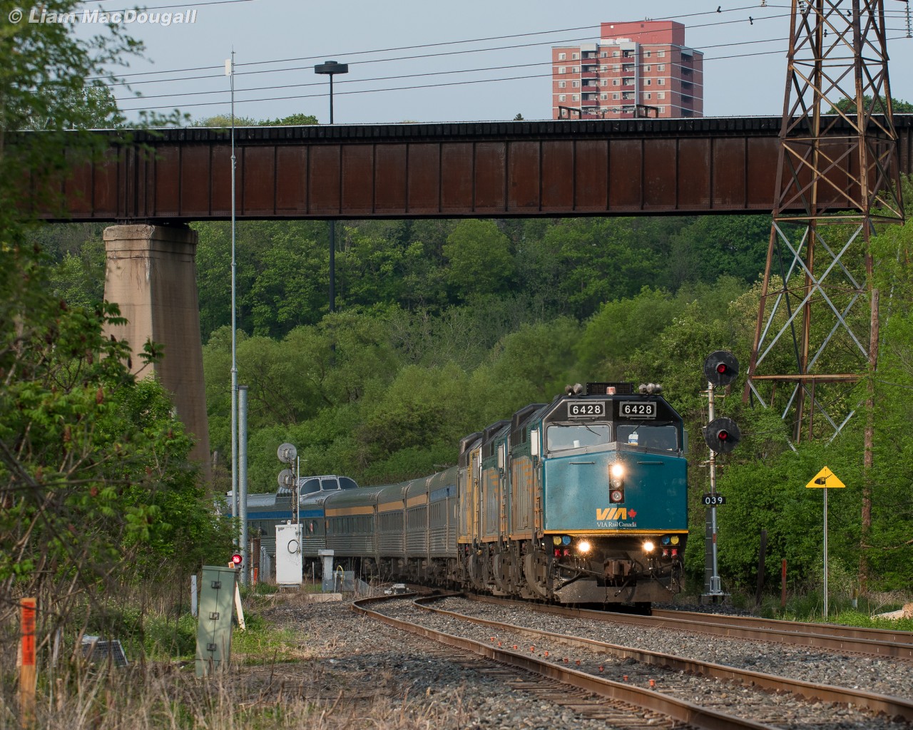 After not running for over 14 months, “The Canadian” finally returned to Toronto today, and is seen here snaking through the Don Valley splitting the searchlights at the north side of Rosedale Siding. Above is the massive viaduct hosting the Abandoned CPR (now Metrolinx-owned) Don Branch.