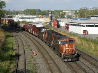 CN 527 has a long train as it heads towards Taschereau Yard with a pair of SD75I's and an NS unit for power (CN 5633, CN 5738 & NS 9932). The SD75I's had been on a CN 322 the week before and the NS unit was from a CN 529 which had terminated at Southwark Yard overnight.