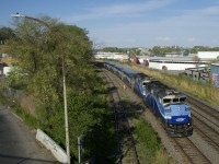 A pair of F59PH's (AMT 1347 & AMT 1342) power EXO 1211 as it passes through Montreal West on the freight track of CN's Montreal Sub.