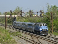 EXO 1211 is almost into Taschereau yard as it prepares to cross over from the north to the freight track. Since the closure of the Mount Royal tunnel last spring (due to work for the REM light rail project), these trains going to Mascouche from downtown Montreal take the long way around Mount-Royal, including crawling through Taschereau Yard at 15 mph.