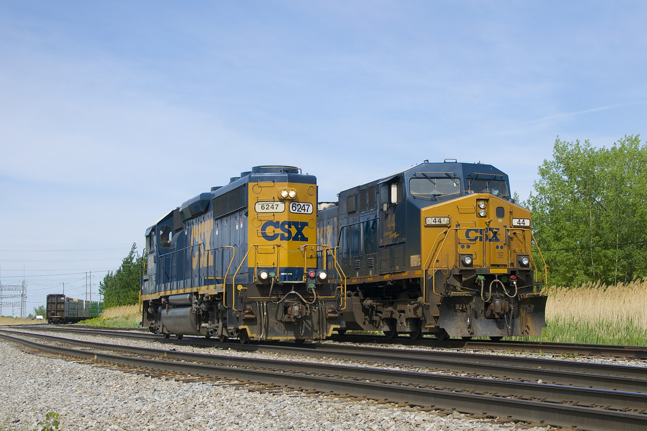 CSXT 6247 is running light power and long hood forward on its way to the Diageo distillery as it passes parked CSXT 44.