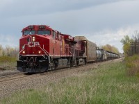 CP 247 charges upgrade at Concession Road 6 behind a fresh AC4400CWM as the skies threatened to open up at any second.