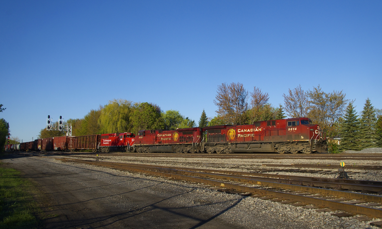 CP 253 is passing the partly torn up Lasalle Yard with consecutively numbered AC4400CW's and GP20C-ECO (CP 9814, CP 9815 & CP 2229).