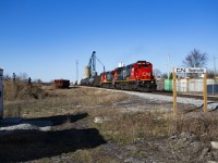 CN A402 passes through the town of Hagersville where at one time, the CASO Sub crossed the Hagersville Sub. The foundation for the tower that once stood here, can be seen in the bottom right corner of the frame. 