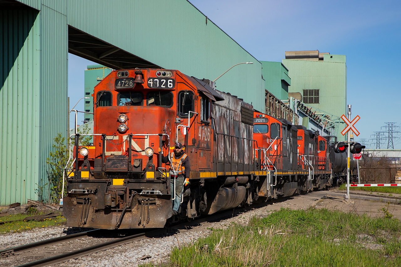 A couple of days after shooting TH11 here, I made a point to catch the 0700 here before work. They were heading east to make a runaround move before making a switch at Parkland - where CP was also headed at the time. The joys of the joint track of the north end of Hamilton. Pictured riding 4726 is Kam - typically I don't like to upload crew shots but Kam is an exception. He is one of the crew members you look forward to seeing while out railfanning, and in fact checks this site out from time-to-time I believe. He was also featured in an upload from February.
