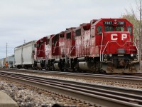 A very rare three unit consist on local T14 today in Streetsville today with former D&H GP38 7307 up front. The train is in the process of working the yard while its Toronto bound cut of cars waits, complete with EOTD armed on the siding in the background.