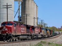 Two days in the making, CP's train 246 finally makes its way west from Toronto after issues yesterday, which forced the train to stay at Lambton till this morning then return to Agincourt and lift today's train 246, combining both trains at Lambton and finally heading westward. The train is seen passing the Ardent mill in Streetsville with more than enough power for the oversized train. The CSX units will not likely return from Buffalo as the should be heading back to home rails.  