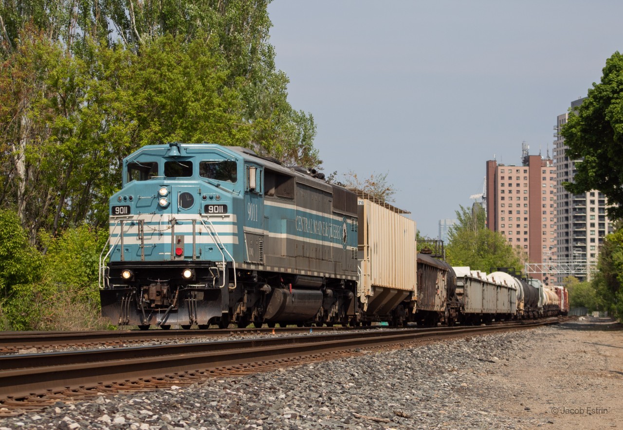 Well, OK..... I guess you should always expect the unexpected? CMQ 9011 leads CP 421 solo onto the Mactier Subdivision at Osler Street in West Toronto.