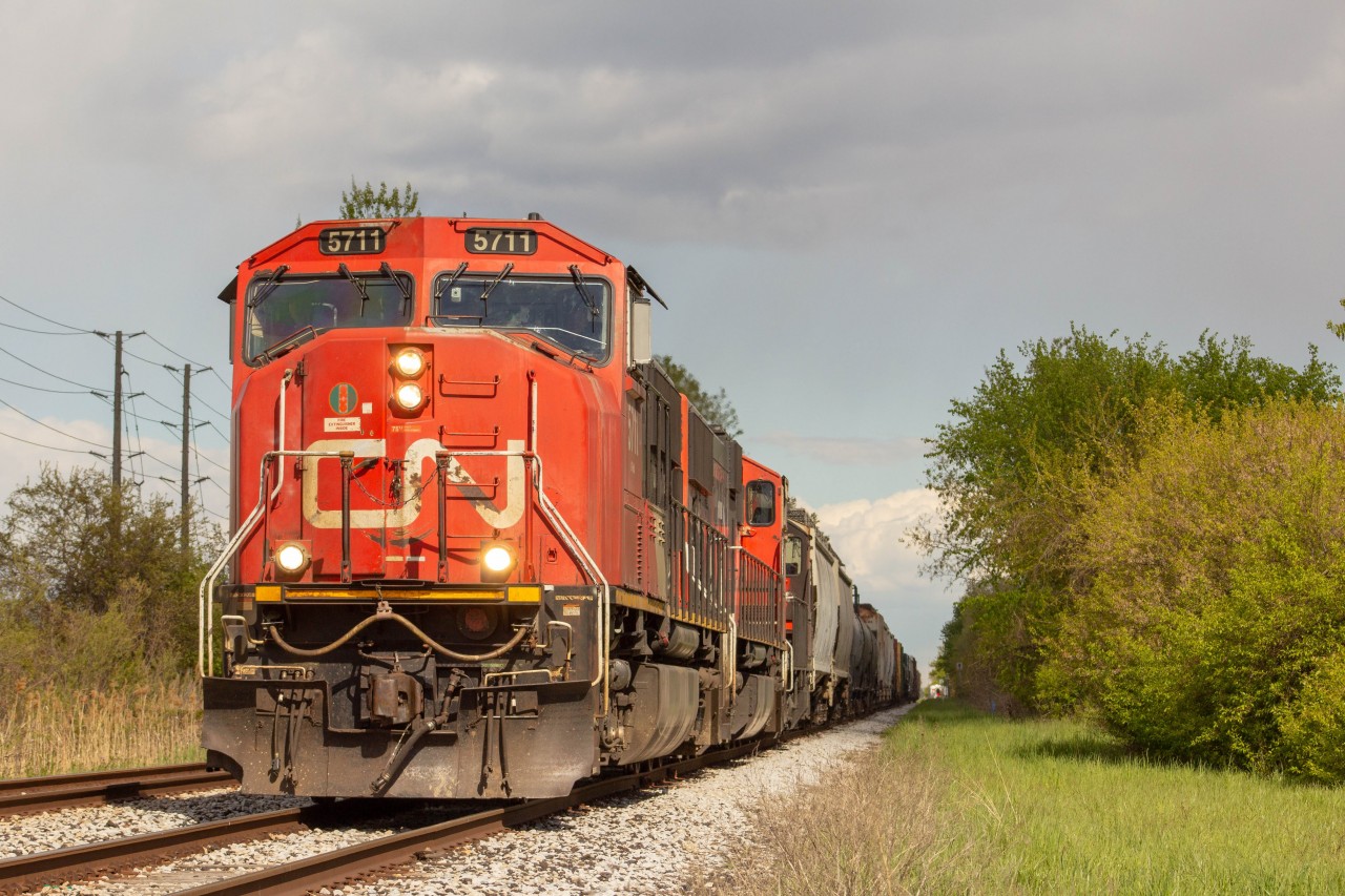 Cn 439 slowly creeps by me with a very solid power set. One of the lucky times where the clouds have just moved out of suns way for my shot.