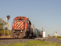 The CP spray train rolls through St. Joachim Ontario, passing by a beautiful photogenic searchlight which is becoming a rare sight to see in Ontario as they are being replaced by Vaders...
