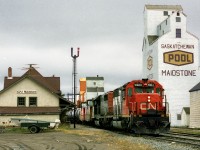 Train 353, Winnipeg to Prince George, operating on the Prairie North Line passes the station and train order office at Maidstone, just east of Lloydminster 