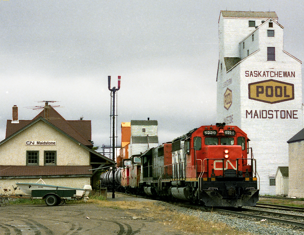 Train 353, Winnipeg to Prince George, operating on the Prairie North Line passes the station and train order office at Maidstone, just east of Lloydminster