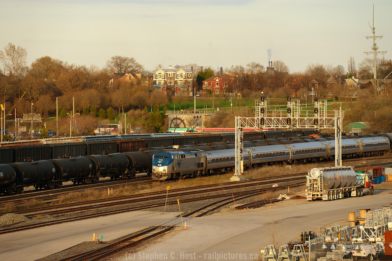 Happy 50'th Amtrak day! VIA 98 is passing through Hamilton at Stuart enroute to Toronto from NYC in golden last rays of sunlight.