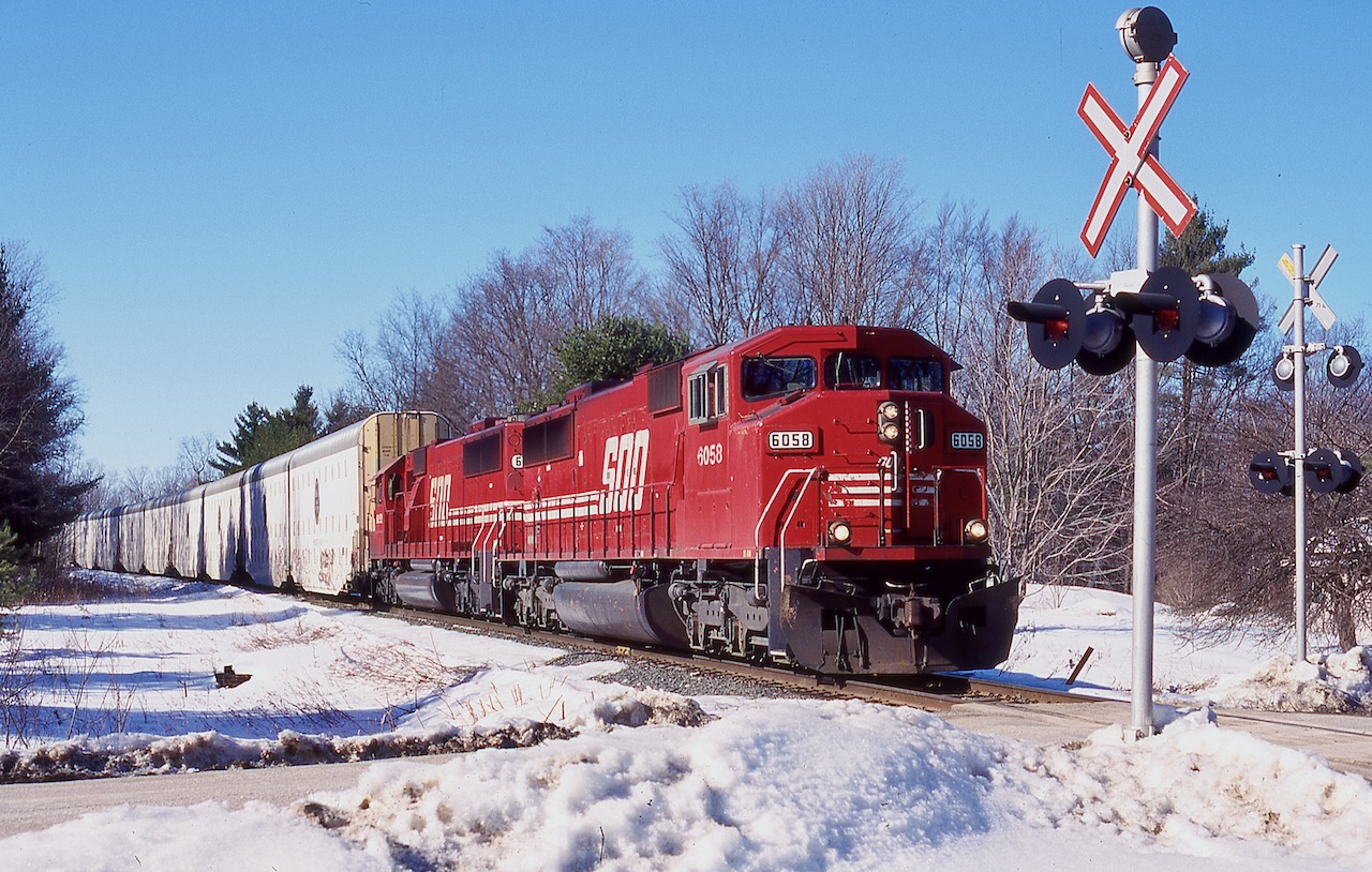 There was a time when SD40's and SD60's dominated most trains on the Hamilton sub. It was nice having the GE's not qualified over the subdivision for a while but that didn't last too long. Train 262 often had long cuts of Auto-max cars traveling to and from the Honda plant in Alliston but unfortunately when the production of the Acura MDX there ended so did the need for the oversized racks. The SOO SD60's were a nice treat and are greatly missed these days. This day a set of SOO SD60M and SD60 are in charge of 262 as the head southbound near Flamboro.