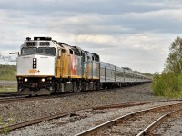 VIA Rail train # 1 slows for its very brief stop at Sudbury (Jct), Ontario on May 26th 2019.  Power for the 21 car train is 6454 and 6458.