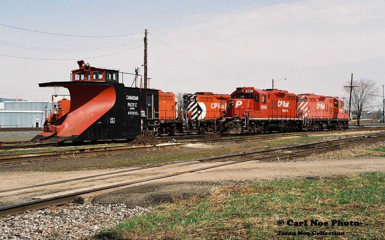 In a follow-up to Steve's recently posted photo of Ontario Southland Railway’s former CP GP9u's working the St. Thomas Subdivision in 2020, two decades prior the CP yard in Woodstock was a much different looking place where these unit’s called home. Here on a quiet weekend morning, the St. Thomas Subdivisions power includes: GP9u's, 8208-1516 and 8210-1614 seen idling away along with the Woodstock assigned plow.