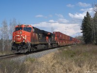 CN 2907 and CN 3167 provide the power for a solid double-stacked 407 at Glenville, NS, milepost 50.28 Springhill sub on May 17th, 2021.