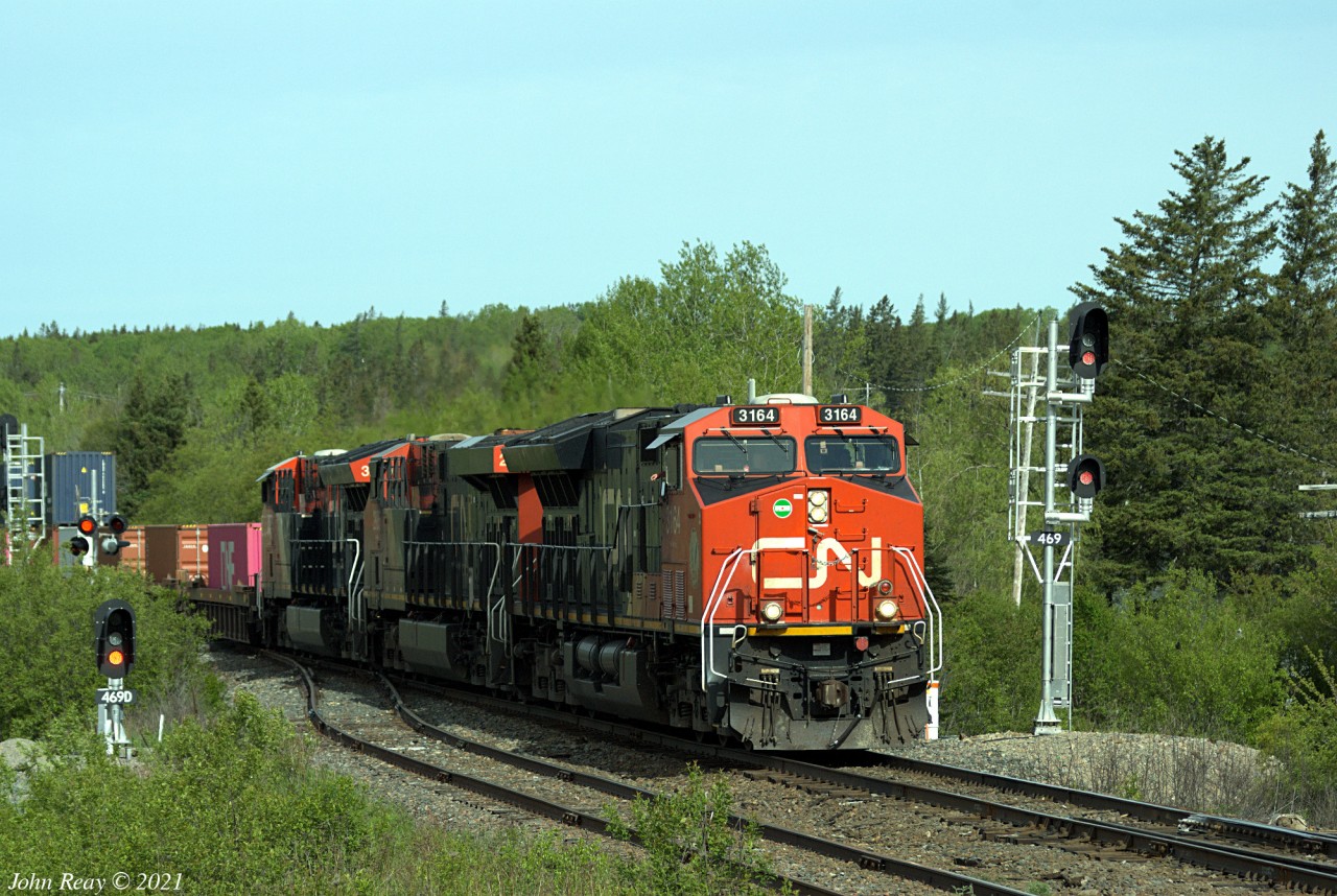 CN 120 at Oxford Junction, NS, milepost 46.9 CN Springhill sub, with CN 3164, 2885, 3279 trailing 406 axles @ 09:09, 2021-05-30.