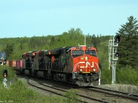 CN 120 at Oxford Junction, NS, milepost 46.9 CN Springhill sub, with CN 3164, 2885, 3279 trailing 406 axles @ 09:09, 2021-05-30.