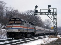 After going through 29 binders of slides spanning roughly 1996 - 2007, I've concluded that I have very few Amtrak photos, and those that I do have I did not go out of my way to get.  Case in point: Feb. 1, 1999 was a P.A. Day, and my Dad dropped me off at Reg Button's house to spend the day with him.  He lived near Kinnear, and the first thing we caught was CP 523 that had NS 8902 in the consist (foreign power was rare at the time).  We, or at least I, photographed it at Kinnear and then we went out to Bayview for another photo.  Those that didn't know Reg need to know that he had a stroke in his later years, and was not the most mobile.  He often drove everywhere he needed to go to get a photo, so that's how we ended up at Bayview Jct., very much trespassing, but I was held against my will!  After photographing CP 523 again, we caught a few CN trains and Amtrak before moving on to Howard Road in Aldershot.  Amtrak had the standard-issue F40PH and five amfleet cars - four coaches and a cafe car.  For a teenager on a budget Amtrak rarely warranted a photo, but on this occasion I must have figured I better take a photo because of where we were.  It was the only day I photographed trains at Bayview Junction proper.  Good old Reggie! 