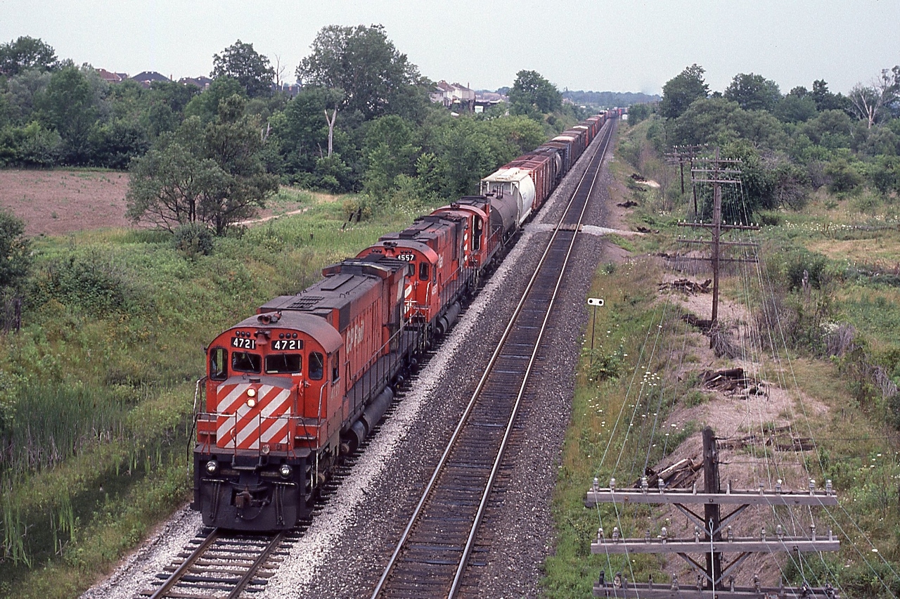 MLW fan delight !

 
   A trio of MLW 's slide into the clear...

 
   MLW 1970 built M-636  4721  -  MLW 1969 built M-630  4557 –  MLW 1957 built RS-18  87xx 

 
   CP Rail 4721 east in the siding at Whitby, July 25, 1982 Kodachrome by S.Danko