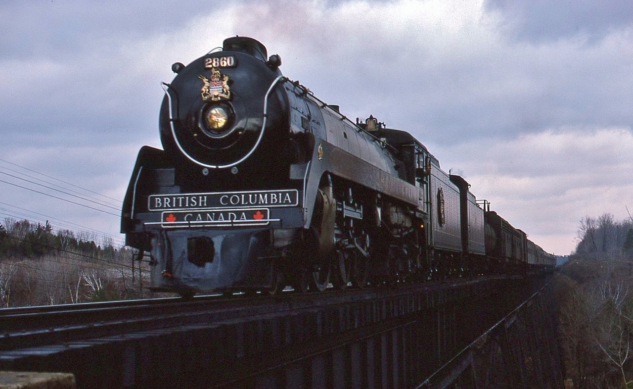 From out of the gloom, the damp photo line has their spirits lifted as the pride of the BCR steams in to view. 

  
   Twenty three years before the 2816 made a re-appearance, the 1978 Royal Hudson "Discover British Columbia" Tour steamed through Ontario, rolling down the Don Branch into Union on April 11, 1978

  
   Forty three years ago, at the Cherrywood viaduct, mile 189 CP Rail Belleville subdivision, April 11, 1978 Kodachrome by S.Danko

  
   The Challenge: dealing with hand held ASA 64 film in low light ! Fast lenses imperative: F2.0 and F1.4, issue being  those lenses can be 'soft' wide open. sdfourty