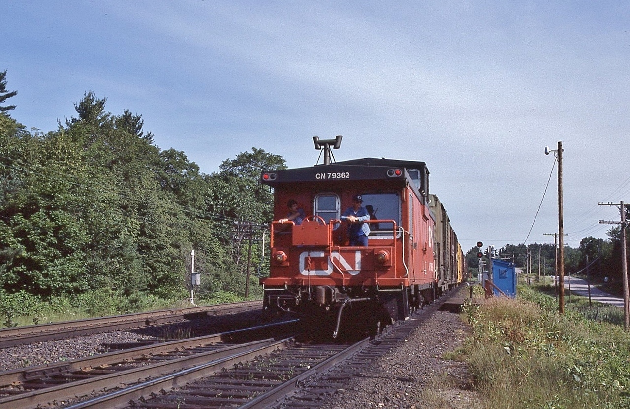 ...inter-active end-of-train device(s)...


   Northbound at CN Boyne, July 22 1984 Kodachrome by S.Danko


   noteworthy: 


   on the left is CP Rail Reynolds mile 19.9 Parry Sound Subdivision,


   note the interchange track to the CN, switch points face north, necessitating a twice daily back up move for VIA 


   VIA at CN Boyne:


    VIA #9