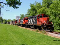 CN L540 trundles southbound along the Huron Park Spur with a 5-pack of classic CN geeps on a pleasant summer day in June 2019.