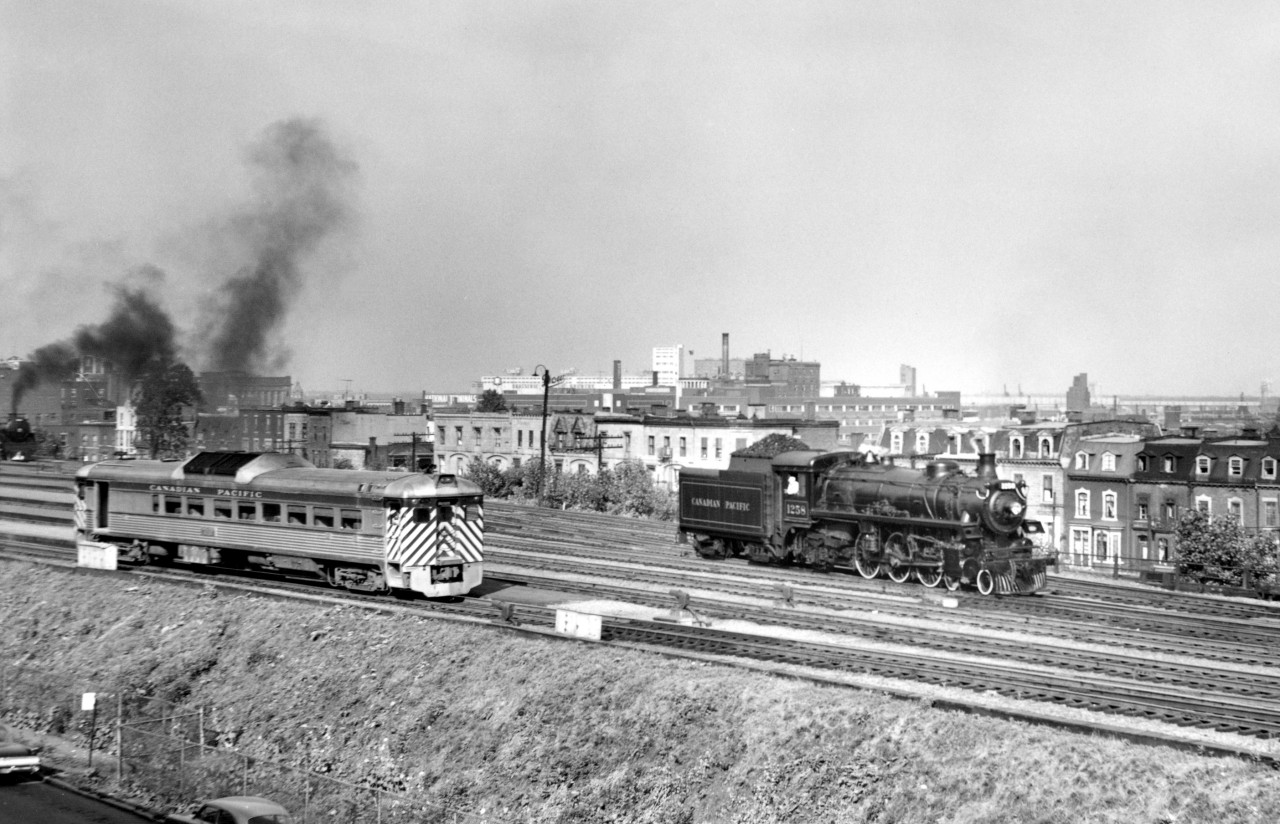 As RDC waits, CP 1258 backs toward its commuter train at Windsor station in Montreal.
