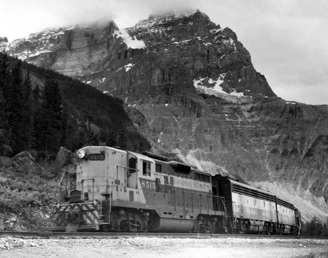 Second section of train 7 with engine 8515 at Yoho.  The road at left is part of the original 4.5% "Big Hill" grade.