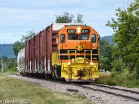 Eastbound from Thurso the QG turn to Ste-Thérèse pulls nine loads through Fassett.