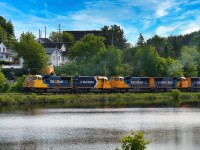 Ontario Northland Southbound 214 curves around Cobalt Lake with Historic Cobalt in the background. Headed up by ONT 2105 followed by ONT 1734, ONT 2102, ONT 2103, and ONT 2101. <br>Mile 103 Temagami Subdivision. June 12.