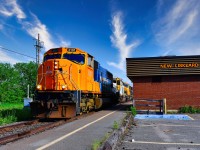 Southbound 214 passes the closed and neglected New Liskeard Train Station that was once a stop on the Ontario Northlander Passenger Train.<br>
Headed up by ONT 2101, followed by ONT 1740, ONT 2103, ONT 2102, and ONT 1730