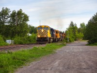 Southbound 214 crosses the rail overpass over Main street in Haileybury, Ontario.<br>
Headed up by ONT 2105 followed by ONT 1734, ONT 2102, ONT 2103, and ONT 2101.