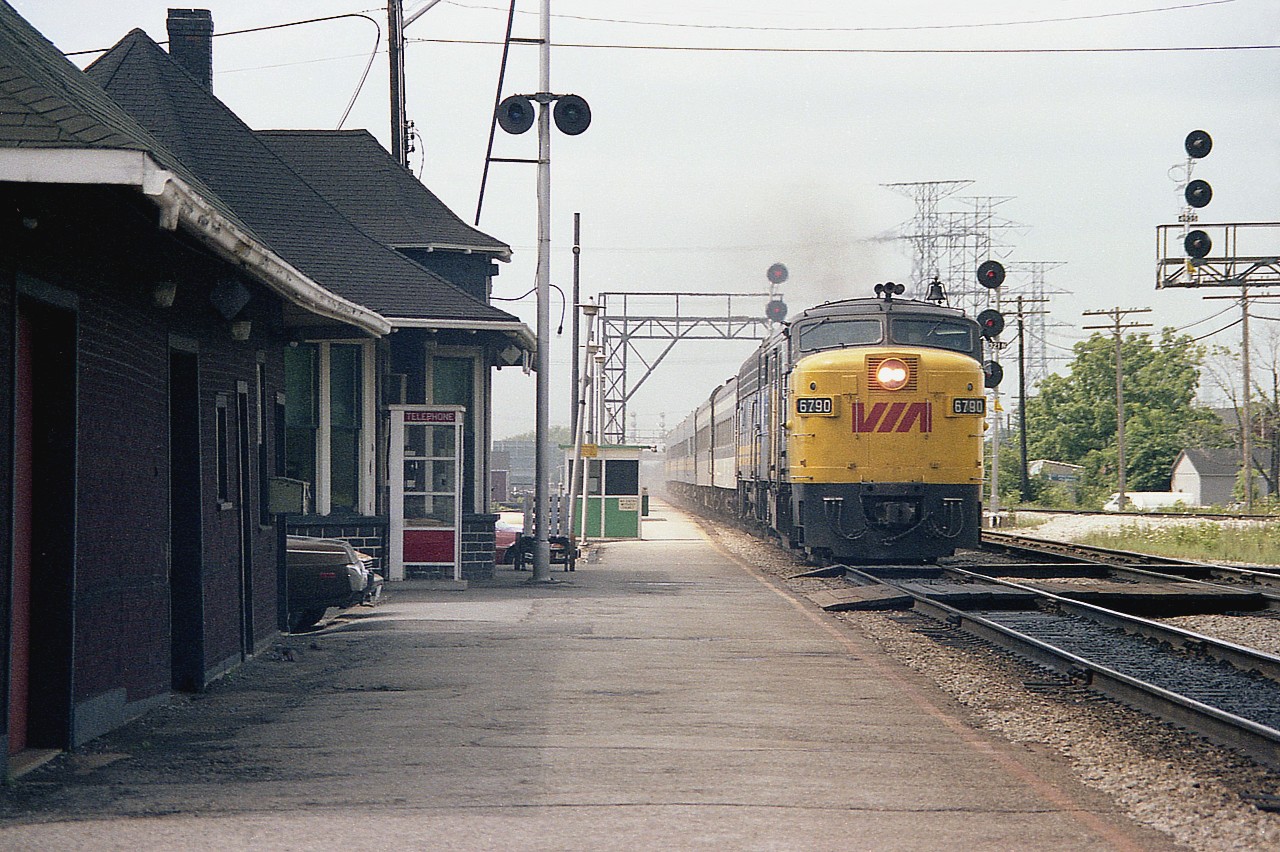 I figure I must have showed up at an opportune time to grab this shot of VIA 6790 barrelling thru past the old station at Burlington West (formerly Freeman Sta); as I neglected to get a train number and the ID of the B unit to my notebook.
Makes for a nice scene though.
The station is restored and relocated over to Fairview Av by the former Beach Sub overpass. The FOFS (Friends Of Freeman Station) are doing a fantastic restoration job; and hopefully there will be an Open House sometime in the fall after this Covid situation is cleared up.......IF it is cleared up.
VIA 6790 is now #73 at Napa Valley Wine Train, in Napa, California.....if still in service.