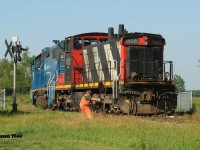 During an early summer morning, back when CN L542 used to work on Sunday's, here CN 1408 and GMTX 2163 switch XV Yard in Guelph as they build their train for industries in the city as well as for the interchange with the Ontario Southland Railway.
