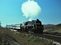 With classic "white smoke" (I know its just steam), CN 6060 heads east at approximately mile 3 of the Halton Sub on Sunday October 5 1975.  And to think we took this for granted back then!!