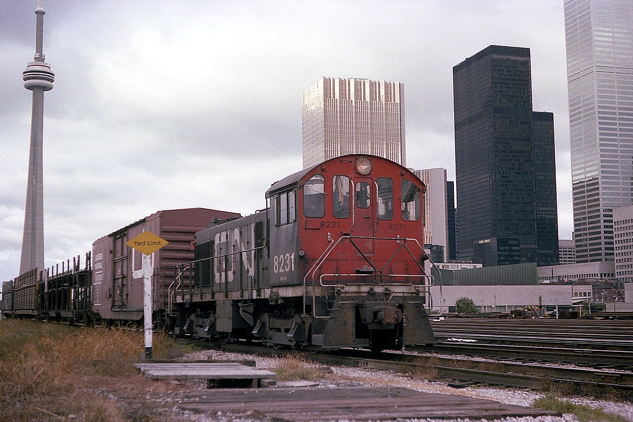 One can see the 'coming of age' with all those new sleek buildings that have taken over the Toronto downtown in this image from back in 1978. Back then one could not imagine what it was going to look like 40+ years later.
In this image CN 8231 is moving eastward with a cut of cars........in behind out of sight is Union Station. This is Toronto downtown as I enjoyed it for photography. Now? I don't want to go near the place. :o)